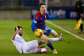 Inverness' Daniel McKay is challenged by Raith Rovers' Regan Tumilty during a Scottish Championship match between Inverness Caledonian Thistle and Raith Rovers at the Tulloch Caledonian Stadium, on March 12, 2021, in Inverness, Scotland. (Photo by Bruce White / SNS Group)