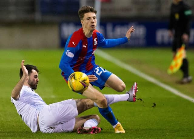 Inverness' Daniel McKay is challenged by Raith Rovers' Regan Tumilty during a Scottish Championship match between Inverness Caledonian Thistle and Raith Rovers at the Tulloch Caledonian Stadium, on March 12, 2021, in Inverness, Scotland. (Photo by Bruce White / SNS Group)