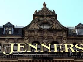 The owner of Edinburgh's Jenners building has launched an investigation after the iconic signage was removed from the landmark store.