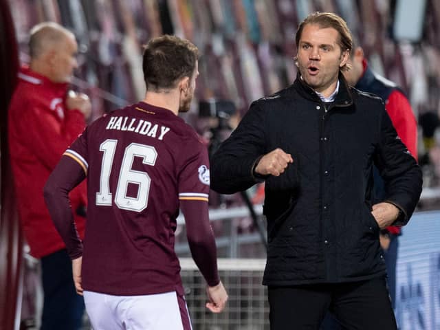 Robbie Neilson praised his Hearts side after crushing Dundee 6-2.