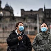 Tourists wearing face masks at Edinburgh Castle in January. Picture: Jeff J Mitchell.