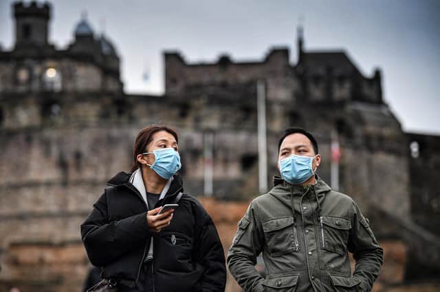 Tourists wearing face masks at Edinburgh Castle in January. Picture: Jeff J Mitchell.