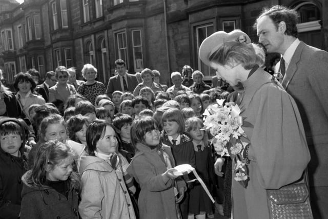 Princess Alexandra chats to some local children at the opening of a new leukaemia treatment centre next to the Royal Hospital for Sick Children in April 1985.