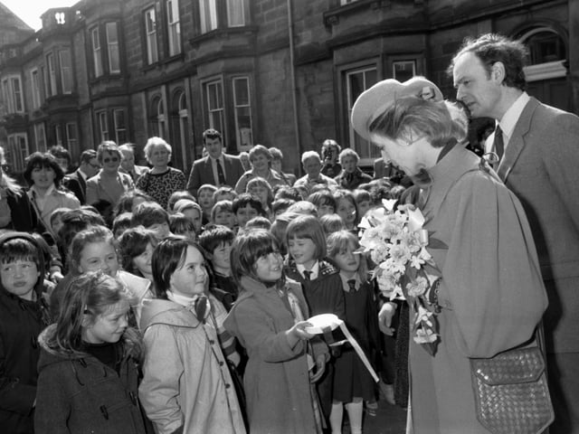 Princess Alexandra chats to some local children at the opening of a new leukaemia treatment centre next to the Royal Hospital for Sick Children in April 1985.