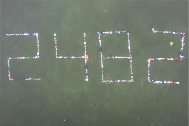 Volunteers used rubbish bags to spell out the number of people who have died from Covid in Scotland. Photo: Lucy Norris