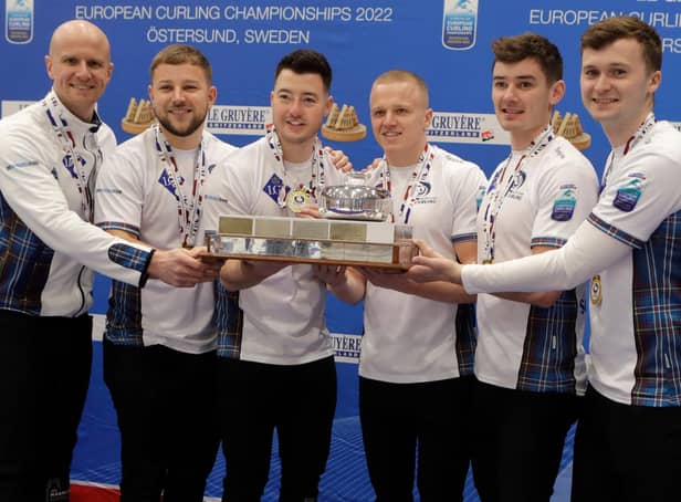 Scotland´s team (from left) coach Michael Goodfellow, Kyle Weddall, Hammy McMillan, Bobby Lammie,Grant Hardie and Bruce Mouat pose with their gold medals after their victory in the men's gold medal at the European Curling Championships. Picture: Mats Andersson/Getty