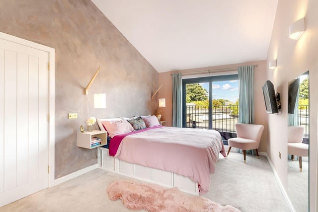 The dual-aspect principal bedroom has the largest footprint of the three bedrooms, boasting an ultra-modern aesthetic and a Juliet balcony. Laid with floor tiles, this stylish room further benefits from an en-suite shower room.