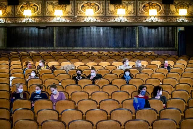 This cinema in Prague asks customers to wear protective masks and sit apart in observance of social distancing measures - could cinemas in Scotland soon look similar? (Photo: Gabriel Kuchta/Getty Images)