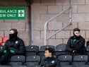 Hibs' Ryan Porteous (L) and Kevin Nisbet (R) were left on the bench against Dundee United after being linked with moves away from the club. Photo by Ross Parker / SNS Group