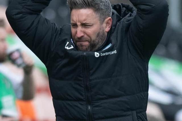 Johnson cuts a frustrated figure at Tannadice, where his Hibs team lost 2-1 on Sunday. Picture: Mark Scates / SNS
