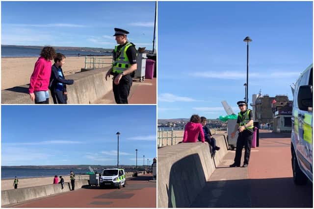 Two young people pictured at Portobello Beach this afternoon being asked to keep moving by an officer.