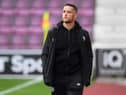 Hearts striker Conor Washington is waiting for news on his future.