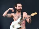 Singer and guitarist Simon Neil from the band Biffy Clyro during a concert on the Danube Island in Vienna. Photo: HERBERT P. OCZERET/AFP via Getty Images.