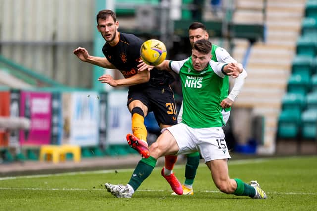 Kevin Nisbet gets stuck in against Rangers during Hibs' 2-2 draw with the Ibrox side at Easter Road