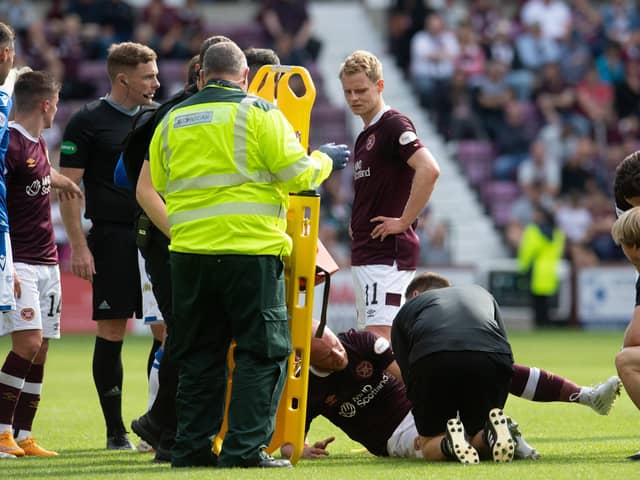 Liam Boyce gets treatment during Hearts' 3-2 win against St Johnstone.