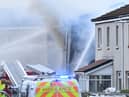Firefighters tackling the blaze in Broomage Crescent, Larbert