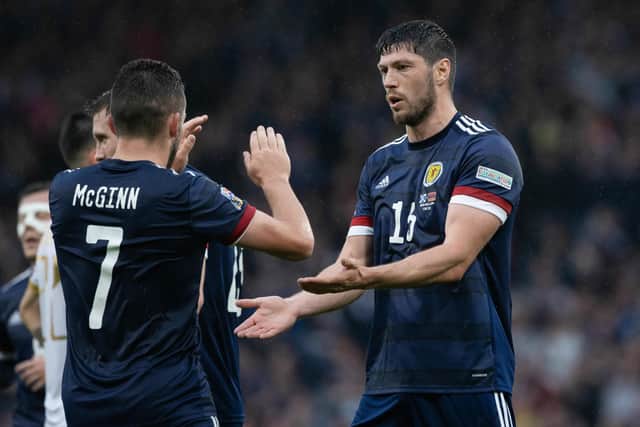 Scott McKenna celebrates with John McGinn as Scotland beat Armenia 2-0 at Hampden Park earlier this year. Picture: SNS