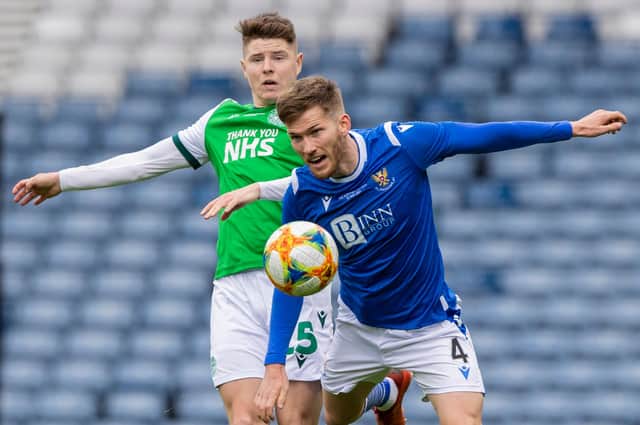 St Johnstone defender Jamie McCart, pictured against Hibs' Kevin Nisbet, is reportedly a target for the Easter Road club.