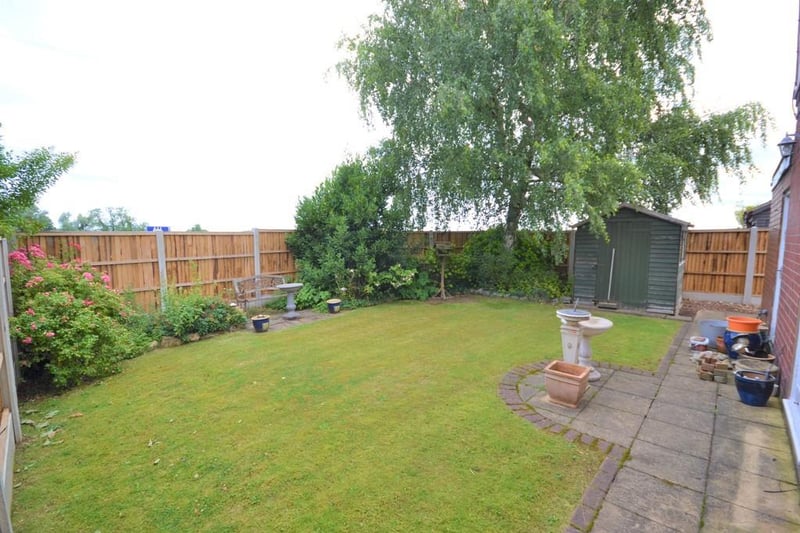 The rear garden provides a good degree of privacy from wooden fenced boundaries and mature hedging, this garden has been paved for ease of maintenance.