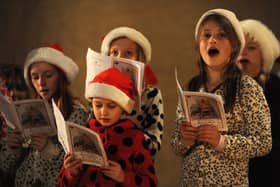 Children enjoying singing Christmas carols