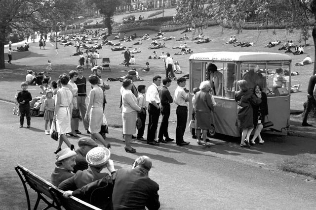 People queue up at the ice-cream kiosk in Princes Street Gardens in May 1966.