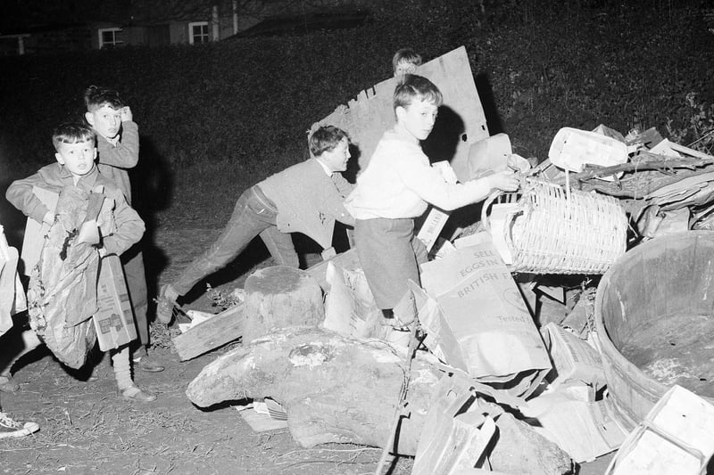 Children piling up their bonfire at Silverknowes, 1960s.