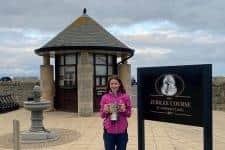 Grace Crawford with the East of Scotland Ladies Championship trophy after her win over the Jubilee Course at St Andrews