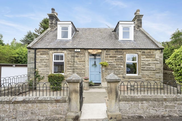 In the top spot, this charming, detached stone cottage in the popular Midlothian town of Gorebridge. The property is beautifully presented and offers everything a growing family could need, including a setting on a generous plot, close to local amenities and transport links. Beautifully blending period details with modern finishings, we can see why so many buyers have been interested in this Gorebridge gem.
It is currently available at a fixed price of £355,000.