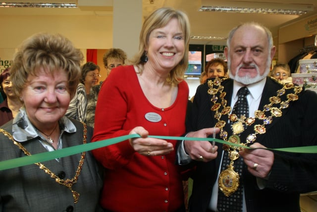The Mayor and Mayoress of Chesterfield perform the re-opening ceremony of the Chesterfield Ashgate Hospice shop assisted by shop manager Pat Standen (centre) in 2009