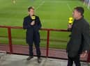 Michael Stewart and Chris Sutton disagree at Tynecastle.