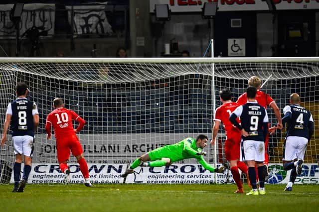 Lee Currie scores to make it 1-0 Bonnyrigg Rose during an epic Scottish Cup tie between Dundee and Bonnyrigg Rose Athletic at Dens Park. The hosts eventually won 3-2 after extra time (Photo by Rob Casey / SNS Group)