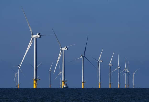 Auctions for offshore windfarm sites in England and Wales resulted in far higher payments than those achieved in the ScotWind sell-off (Picture: Mike Hewitt/Getty Images)
