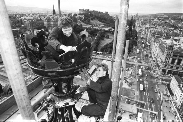 Before taking it away for restoration, workmen detach the 'crown' from the very top of the North British hotel (NB hotel/Balmoral hotel) in Princes Street Edinburgh, August 1989.