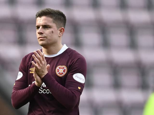 Hearts midfielder Cammy Devlin is eager to help his team get a result at Ibrox.