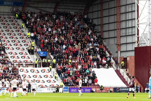Aberdeen fans within the single section away end at Tynecastle Park during the last meeting between the clubs in May. Picture: SNS