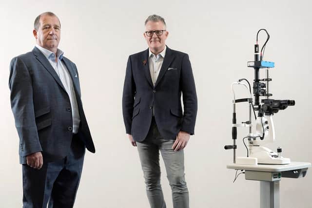 Graham Bell and David Quigley of Edinburgh Biosciences with the company's LEDINBIO device. Picture: Stewart Attwood