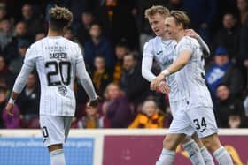 Sylvester Jasper set up two goals for Elias Melkersen, right, in Hibs' 2-1 victory over Motherwell in the Scottish Cup last weekend. Picture: SNS