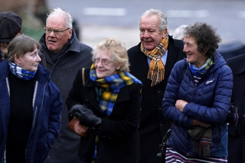 Former rugby union player Bill Beaumont (back right) at Melrose Parish Church before a memorial service for Doddie Weir.