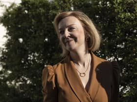 Like the other candidates to be Conservative leader, Liz Truss will not scrap the plan to send migrants to Rwanda (Picture: Dan Kitwood/Getty Images)