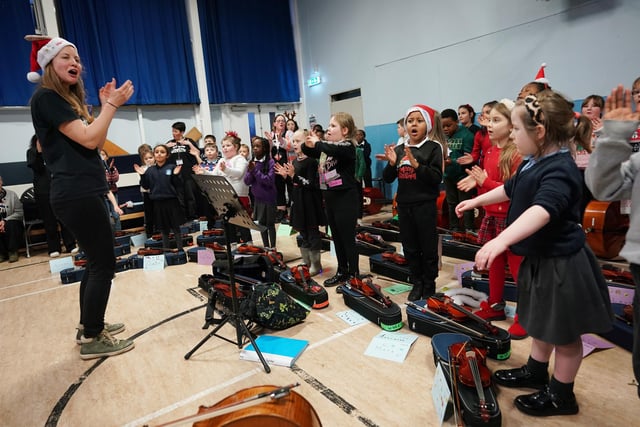 These youngsters are pictured clapping along at the Christmas concert in Wester Hailes.