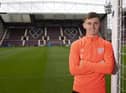 Ben Woodburn says he is in a 'good place' at Hearts and has no regrets about leaving Liverpool to spend the season on loan in Edinburgh