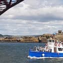 Forth Boat Tours' Forth Princess cruises beneath the iconic Forth Rail Bridge