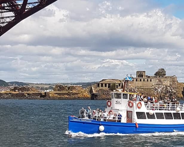 Forth Boat Tours' Forth Princess cruises beneath the iconic Forth Rail Bridge