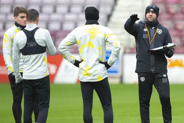 Robbie Neilson issues instructions to the Hearts players in training ahead of Saturday's match at Tynecastle. Picture: SNS