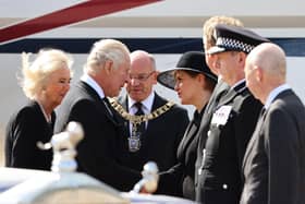 King Charles III and the Queen Consort (left) are greeted by First Minister Nicola Sturgeon as they arrive at Edinburgh Airport after travelling from London, ahead of joining the procession of Queen Elizabeth's coffin from the Palace of Holyroodhouse to St Giles' Cathedral, Edinburgh. Picture date: Monday September 12, 2022.