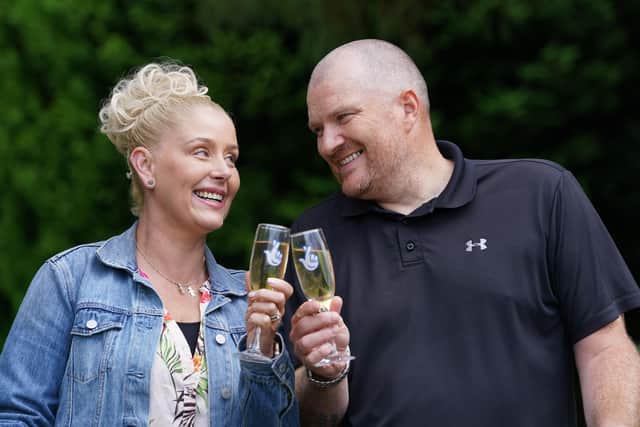 Here's to us - and Lucky Dips: Louise and Paul Drake toast their £5.16 million pound lottery win