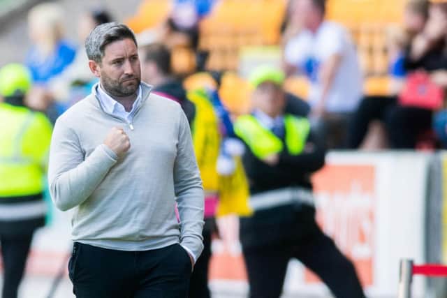 Hibs manager Lee Johnson celebrates at McDiarmid Park. Picture: Mark Scates / SNS