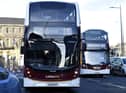 Lothian Buses' boss Nigel Serafini may be forced to give up his bonus