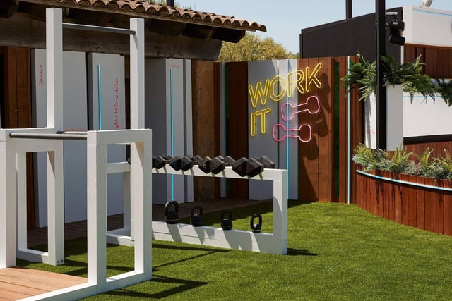 Of course, the Love Island villa wouldn't be complete without a space for the Islanders to stay in shape - with the essential inspiring neon sign.