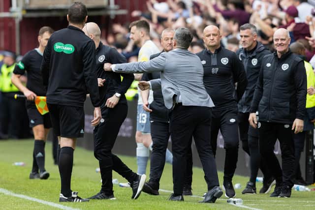Interim Hearts manager Steven Naismith and Hibs manager Lee Johnson clash after the final whistle at Tynecastle.